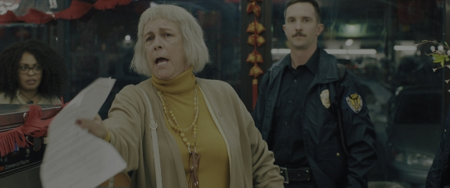 Wide shot frame from Everything Everywhere All at Once — dialogue, street, uniform