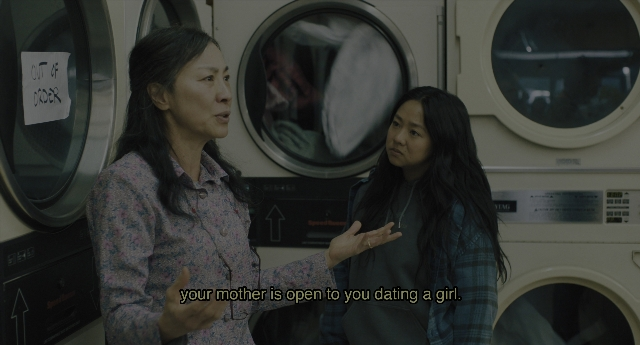 Wide shot frame from Everything Everywhere All at Once — standing, hair, person