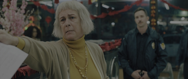 Wide shot frame from Everything Everywhere All at Once — standing, room, uniform