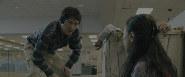 Wide shot frame from Everything Everywhere All at Once — room, dialogue, shirt