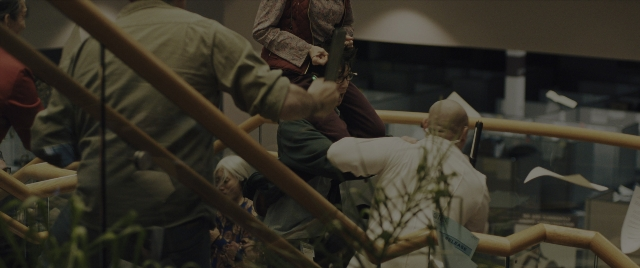 Wide shot frame from Everything Everywhere All at Once — standing, hat, shirt