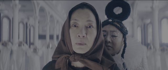 Medium shot frame from Everything Everywhere All at Once — room, face, person