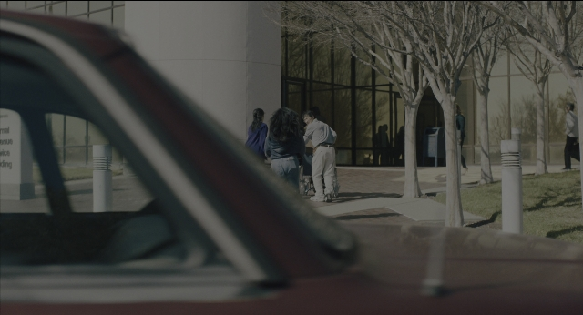 Wide shot frame from Everything Everywhere All at Once — walking, dialogue, street