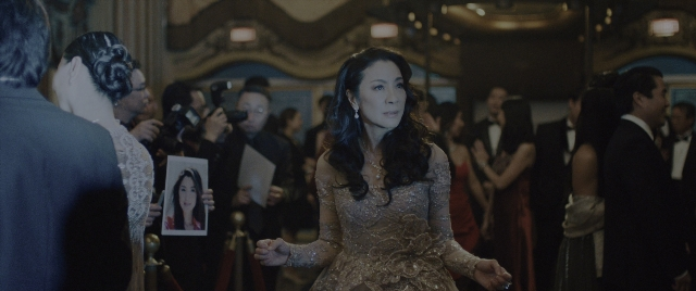 Wide shot frame from Everything Everywhere All at Once — standing, room, dialogue