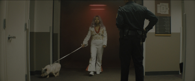 Wide shot frame from Everything Everywhere All at Once — standing, walking, door