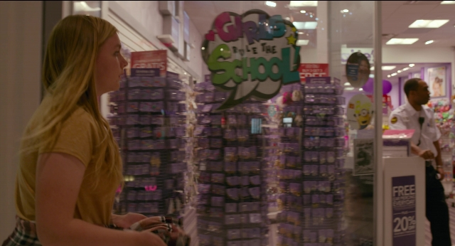 Wide shot frame from Eighth Grade — standing, shirt, face
