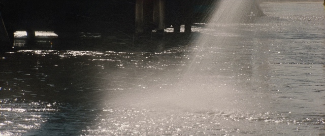 Wide shot frame from The Way Back — standing, mirror, water