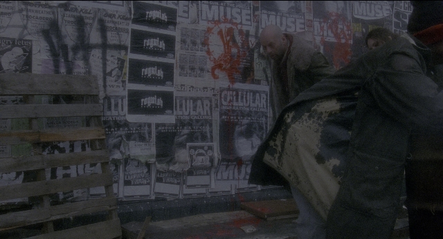 Wide shot frame from Twelve Monkeys — standing, walking, person
