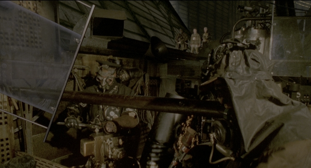Wide shot frame from Twelve Monkeys — standing, person
