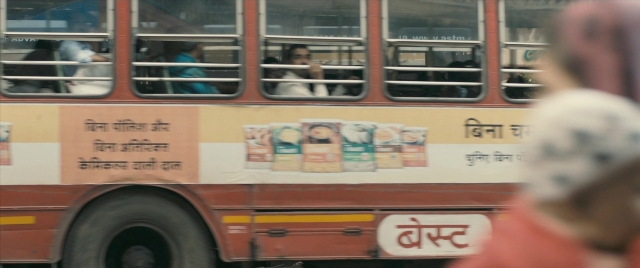 Wide shot frame from The Lunchbox — people, action, show