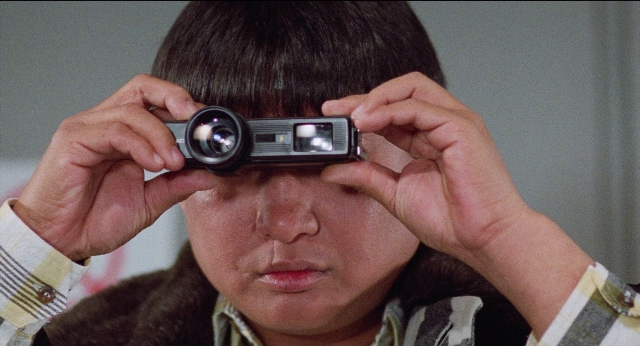 Frame from Fei lung mang jeung — room, shirt, face