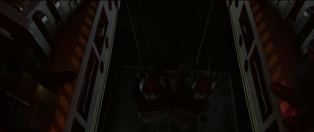 Wide shot frame from The Hunger Games: Mockingjay - Part 1 — person, building