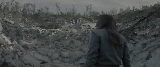 Wide shot frame from The Hunger Games: Mockingjay - Part 1 — standing, person