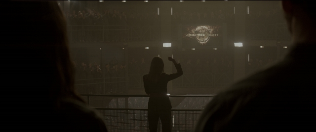 Wide shot frame from The Hunger Games: Mockingjay - Part 1 — standing, fight, person