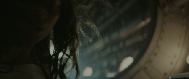 Wide shot frame from The Hunger Games: Mockingjay - Part 1 — face, hair, person