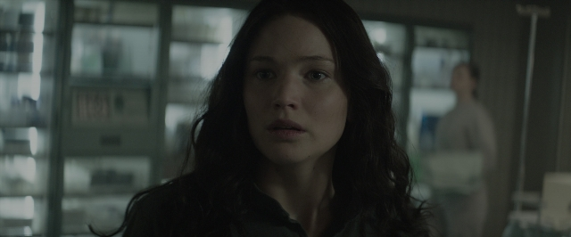 Medium shot frame from The Hunger Games: Mockingjay - Part 1 — dialogue, shirt, face