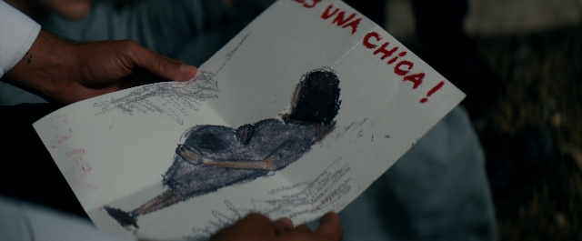 Frame from Prey for the Devil — sitting, table, bird