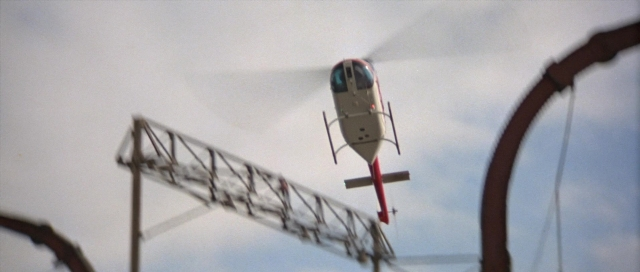 Wide shot frame from For Your Eyes Only — airplane, running