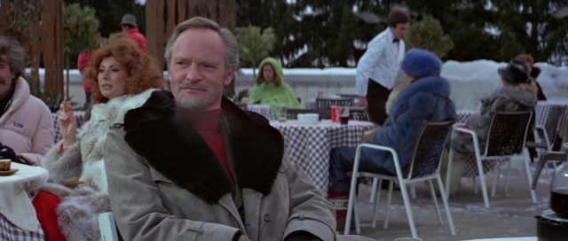 Wide shot frame from For Your Eyes Only — sitting, plate, table