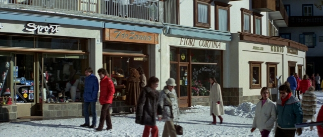 Wide shot frame from For Your Eyes Only — walking, street, snow