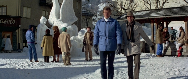 Wide shot frame from For Your Eyes Only — sitting, walking, street