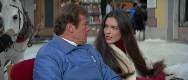 Wide shot frame from For Your Eyes Only — sitting, walking, dialogue