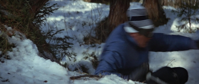 Wide shot frame from For Your Eyes Only — snow, person, footwear