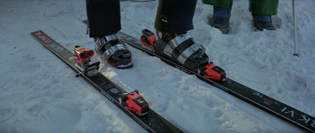 Wide shot frame from For Your Eyes Only — standing, snow, ski