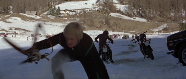 Wide shot frame from For Your Eyes Only — car, snow, wheel