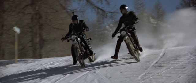 Wide shot frame from For Your Eyes Only — bicycle, snow, person