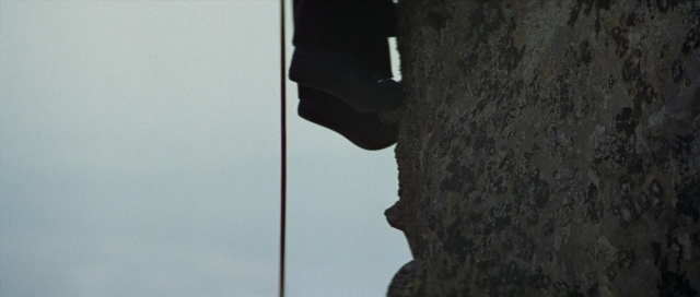 Medium shot frame from For Your Eyes Only — face, person, footwear
