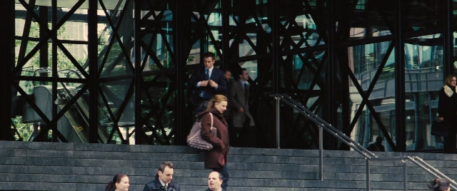 Wide shot frame from Jack Ryan: Shadow Recruit — walking, glass, person
