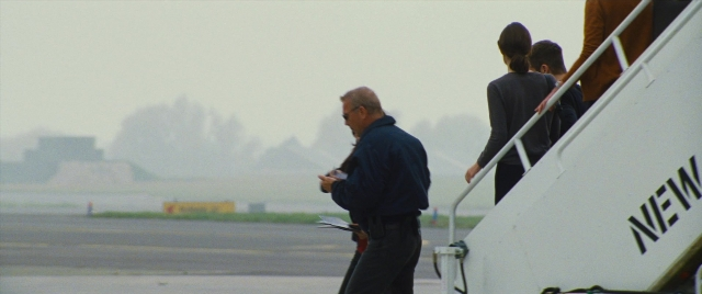 Frame from Jack Ryan: Shadow Recruit — standing, airplane, person