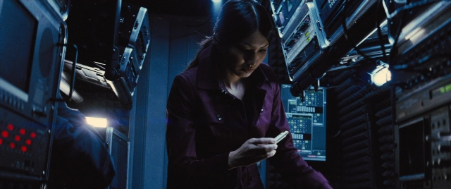 Wide shot frame from Jack Ryan: Shadow Recruit — standing, room, phone