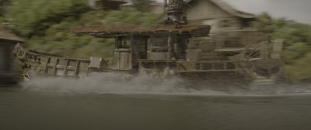 Wide shot frame from Jungle Cruise — water, boat, person