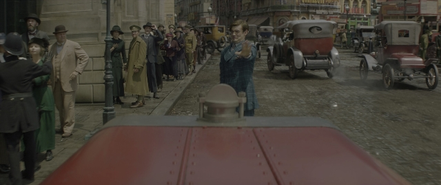 Wide shot frame from Jungle Cruise — standing, walking, street
