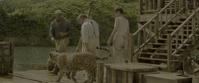 Wide shot frame from Jungle Cruise — standing, walking, shirt