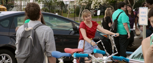 Wide shot frame from 21 Jump Street — standing, street, car