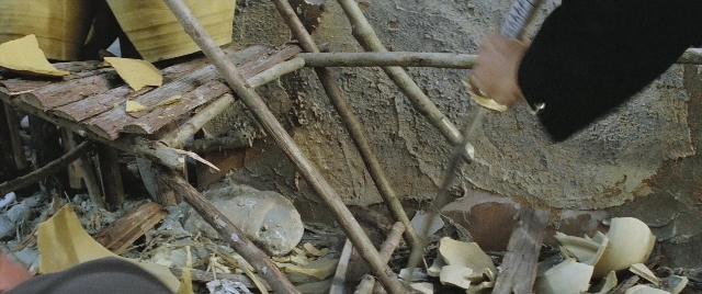Wide shot frame from Zhong hua zhan shi — hand, person