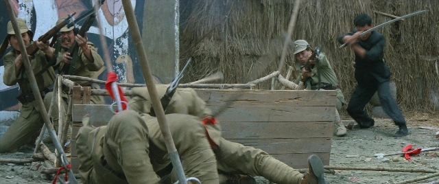 Wide shot frame from Zhong hua zhan shi — standing, gun, bird