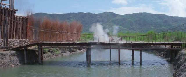 Wide shot frame from Zhong hua zhan shi — water, fountain