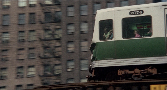 Wide shot frame from Medium Cool — train, person, human face