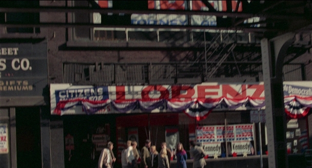 Wide shot frame from Medium Cool — walking, street, night