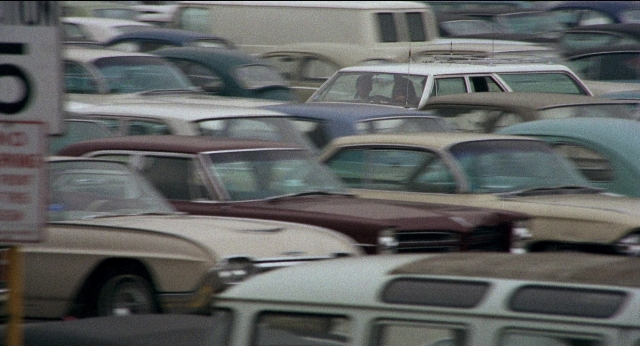 Frame from Medium Cool — car, wheel