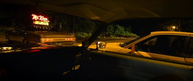 Wide shot frame from Need for Speed — action, car, drive