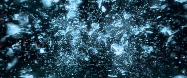 Wide shot frame from Need for Speed — glass, fountain, window