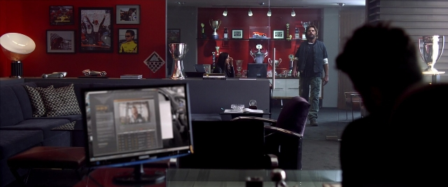 Wide shot frame from Need for Speed — people, action, standing
