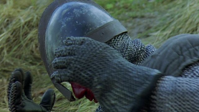 Wide shot frame from Robin Hood: Prince of Thieves — hat, glove, person