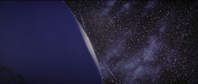 Wide shot frame from Carlito's Way — night, fountain