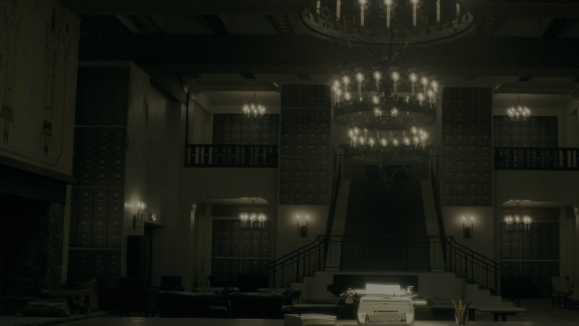 Wide shot frame from Doctor Sleep — room, table, building